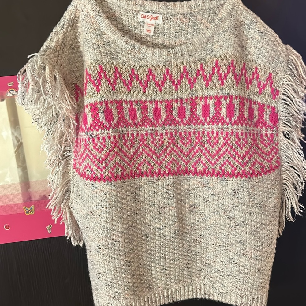 Cat and Jack sweater can be used as a vest size large 10 through 12 like new